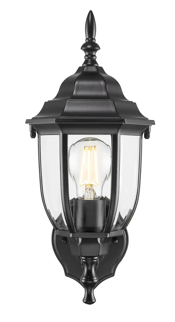 The Wexford wall lantern combines traditional styling with modern durability. Featuring cast aluminum construction and clear beveled glass, this compact fixture delivers reliable outdoor lighting with timeless appeal. - alternate view