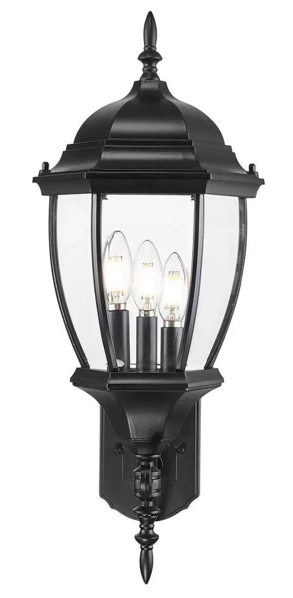 The Wexford 3-Light Wall Lantern combines traditional styling with modern durability. Featuring cast aluminum construction and clear beveled glass panes, this fixture delivers timeless curb appeal and reliable outdoor performance. - alternate view