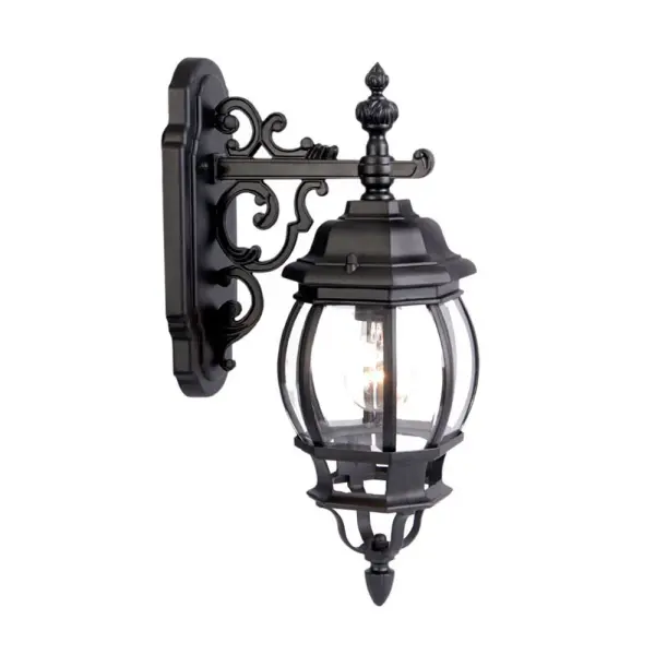 The Chateau wall sconce combines traditional styling with modern durability. Its cast aluminum construction and matte black finish resist weather while the clear beveled glass adds elegant light diffusion for entryways and outdoor spaces.