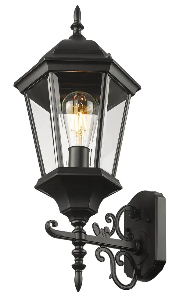 The Richmond wall sconce combines traditional lantern styling with modern durability. Its cast aluminum construction and matte black finish resist weather while clear beveled glass adds elegant light diffusion for entryways and outdoor spaces. - alternate view