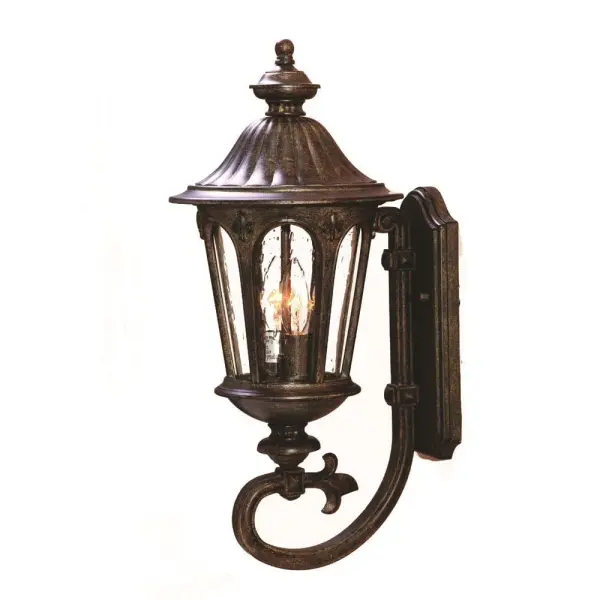 The Marietta 3-Light Wall Sconce brings traditional elegance to outdoor spaces with its cast aluminum construction and distinctive clear seeded glass globes. The Black Coral finish adds coastal sophistication.