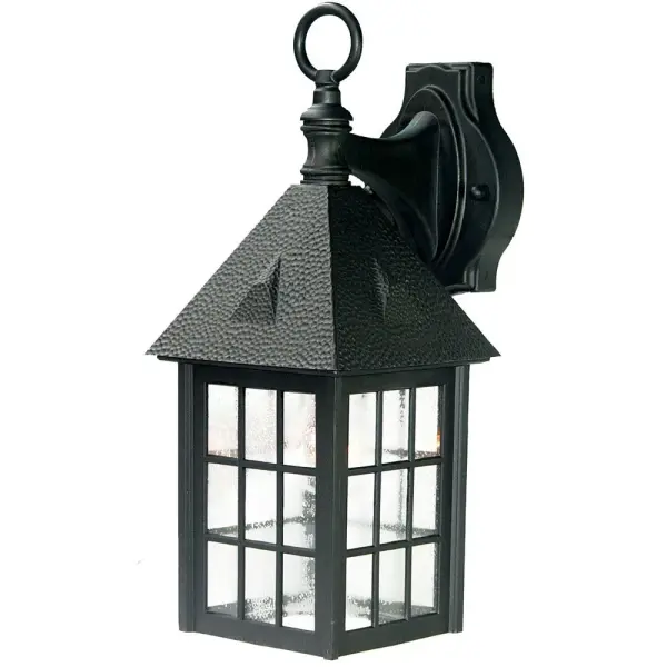 The Outer Banks wall sconce brings nautical elegance to outdoor spaces with its matte black finish and clear seeded acrylic shade. Compact yet impactful, it's perfect for flanking entryways or illuminating porches with coastal character.
