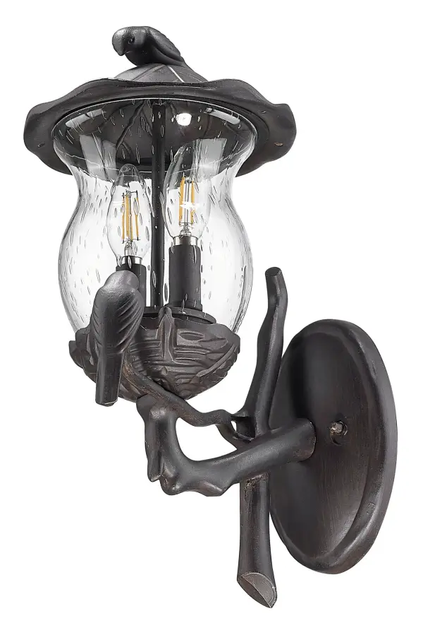 The Avian 2-Light Wall Sconce combines durable cast aluminum construction with charming clear seeded glass globes. Its compact 16.5" height and traditional styling make it ideal for flanking doors or illuminating outdoor spaces. - alternate view