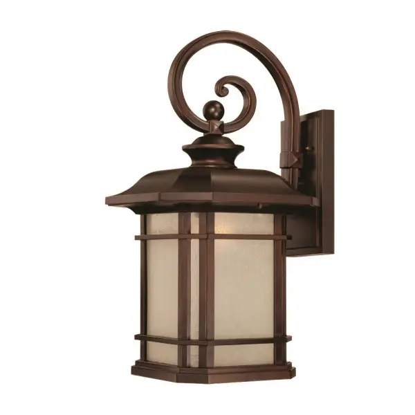 The Somerset wall lantern combines traditional styling with modern durability. Its cast aluminum construction and architectural bronze finish resist weather while frosted seeded glass panels provide warm, diffused light.