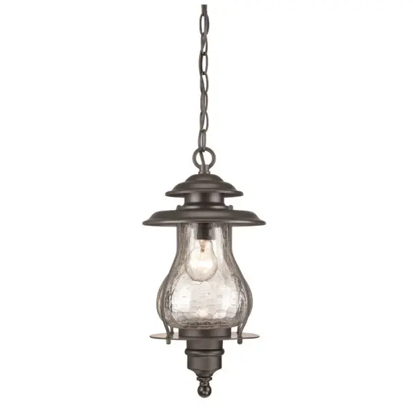 The Blue Ridge hanging lantern brings timeless farmhouse appeal to outdoor spaces with its matte black finish and distinctive crackled glass. Compact yet impactful, it's perfect for porches, patios, and entryways.