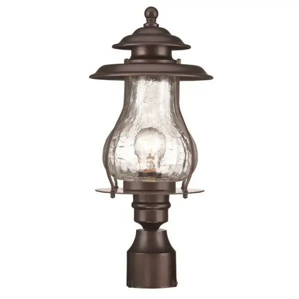 The Blue Ridge post mount brings timeless farmhouse appeal to outdoor spaces with its architectural bronze finish and distinctive crackled glass. At 18 inches tall, it provides substantial presence for pathways and entryways.