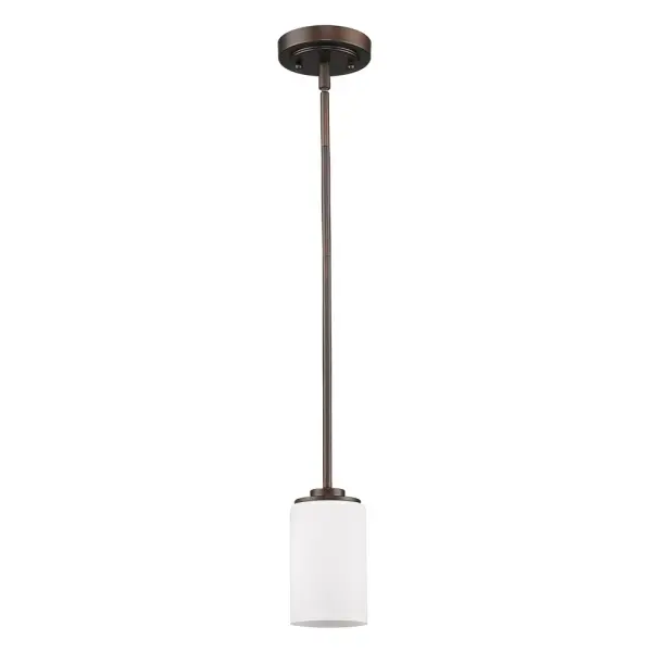 The Addison mini pendant delivers classic style in a compact 5" wide profile. Oil rubbed bronze finish and opal glass create warm, diffused light ideal for task lighting or accent placement in smaller areas.
