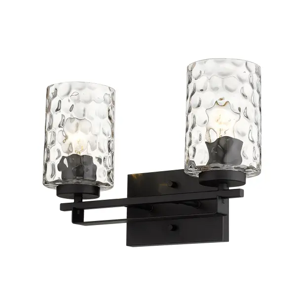 The Livvy 2-Light Vanity combines matte black steel construction with hand-blown clear optic glass for a sophisticated industrial aesthetic. Its compact 15-inch width makes it ideal for smaller vanities while providing ample illumination. - alternate view
