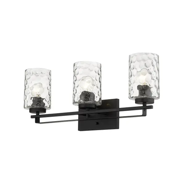 The Livvy 3-Light Vanity combines matte black steel construction with hand-blown clear optic glass for a sophisticated industrial aesthetic. At 24 inches wide, it's perfectly sized for standard bathroom vanities. - alternate view