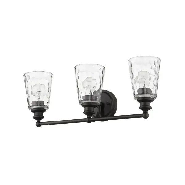 The Mae 3-Light Sconce combines industrial charm with transitional elegance. Featuring hand-blown clear optic glass shades and oil-rubbed bronze finish, this 22.75" wide fixture provides ample illumination for vanities and walls. - alternate view