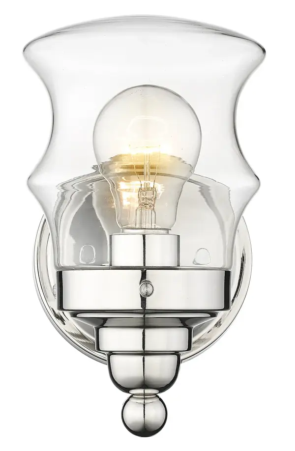 The Keal wall sconce combines timeless design with practical functionality. Its polished nickel finish and clear glass shade deliver clean, bright illumination ideal for vanity applications and hallways.