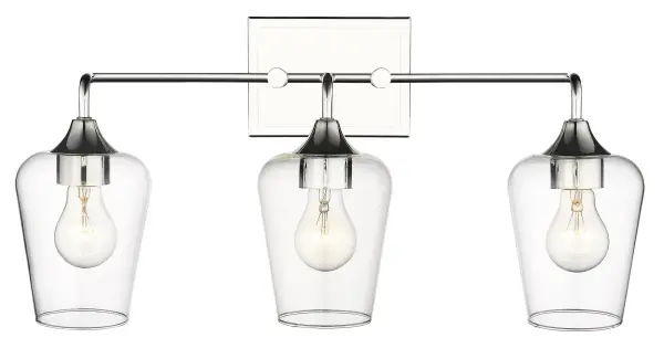 The Gladys 3-Light Wall Light combines transitional styling with polished nickel and clear glass for versatile illumination. At 23 inches wide, it provides substantial lighting perfect for bathrooms, hallways, and bedrooms.