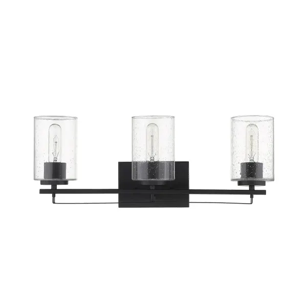 The Orella 3-Light Sconce combines industrial styling with practical vanity lighting. Three clear seeded glass cylindrical shades provide ample illumination while the matte black steel frame adds modern edge to bathrooms and bedrooms.