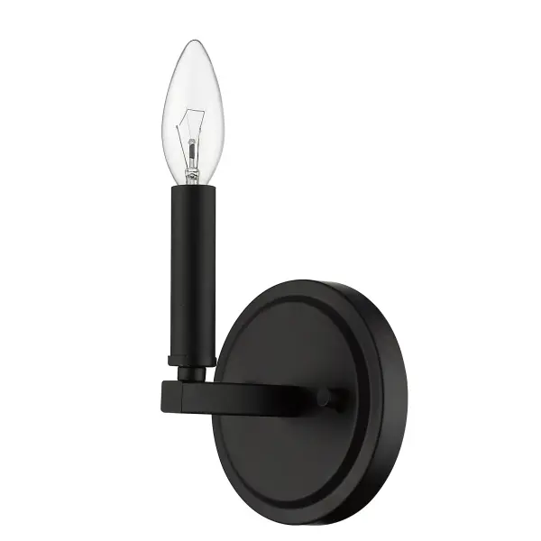 The Sawyer wall sconce delivers industrial charm in a compact 6.6-inch profile. Its matte black steel construction and candelabra socket create versatile ambient lighting perfect for smaller spaces and hallways.