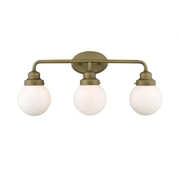 The Portsmith 3-Light Vanity Sconce combines industrial design with transitional warmth through its raw brass finish and clear glass globes. At 26 inches wide, it provides excellent illumination for medium to large vanities. - alternate view