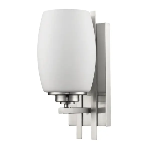 The Sophia sconce combines clean lines with soft opal glass for versatile wall lighting. Its compact 11.5" height and satin nickel finish make it ideal for bathrooms, hallways, and bedrooms where understated elegance is desired.