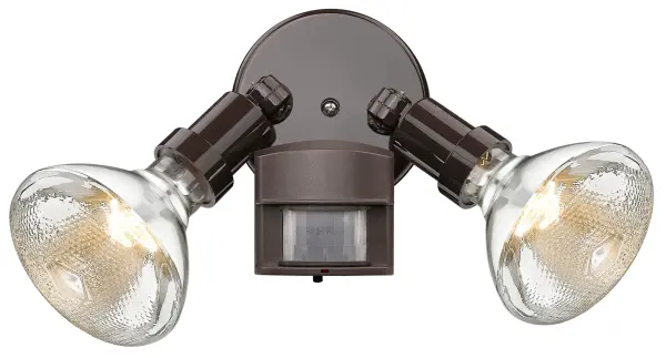 This dual-head floodlight combines practical motion detection with durable construction. The architectural bronze finish and polycarbonate shades provide weather resistance while delivering bright, energy-efficient illumination. - alternate view
