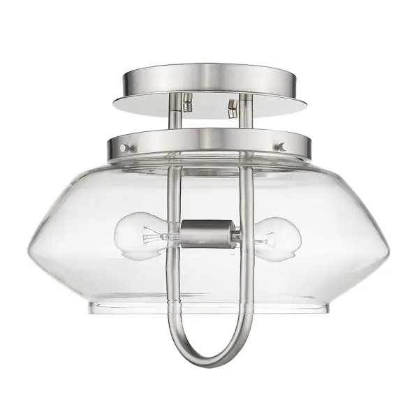 The Garner 2-light semi-flush mount offers a sleek, transitional design perfect for spaces with lower ceilings. Its clear glass drum shade and satin nickel finish provide timeless appeal in compact rooms.