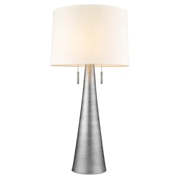 The Muse table lamp combines classic form with a sophisticated weathered pewter finish and off-white fabric shade. At 33.5" tall, it provides substantial presence and ambient lighting for living spaces, bedrooms, or offices. - alternate view