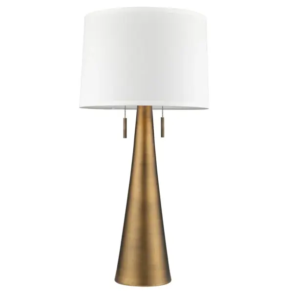The Muse table lamp combines hand-painted weathered pewter metalwork with a classic off-white shantung shade, creating a sophisticated lighting solution that bridges traditional and contemporary design.