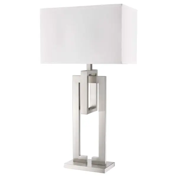 The Precision table lamp combines brushed nickel steel construction with a sophisticated ivory shantung fabric shade. At 36" tall with a generous 19" shade width, it provides substantial lighting and visual presence for living spaces and offices.