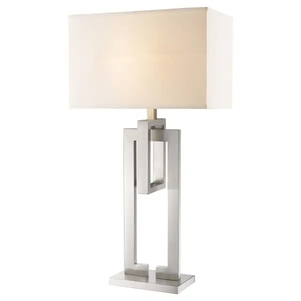 The Precision table lamp combines brushed nickel steel construction with a sophisticated ivory shantung fabric shade. At 36" tall with a generous 19" shade width, it provides substantial lighting and visual presence for living spaces and offices. - alternate view