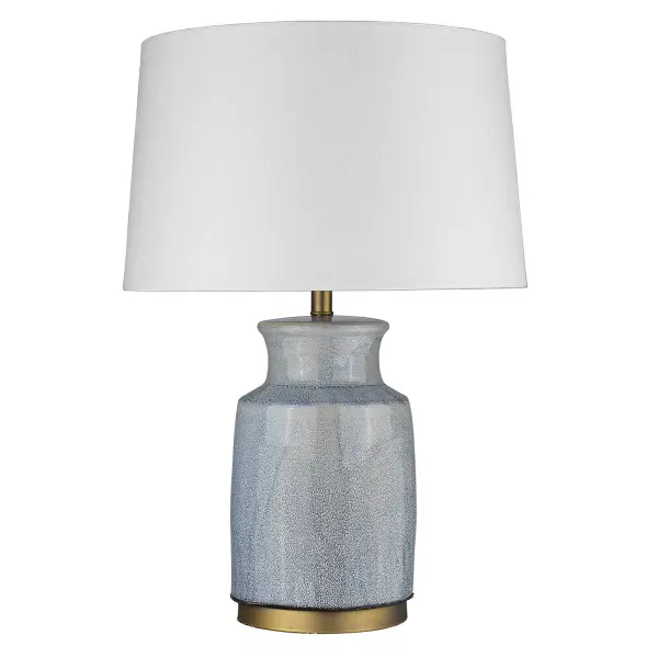 This substantial 27-inch table lamp combines a ceramic base with brass accents and a neutral seasalt linen shade. The 3-way rotary switch offers versatile lighting control, while the generous 19-inch width provides commanding presence.