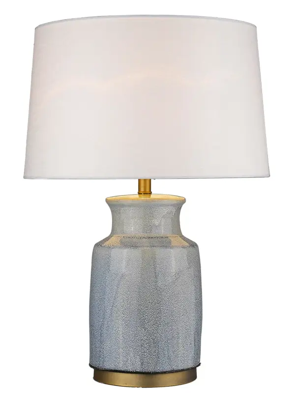 This substantial 27-inch table lamp combines a ceramic base with brass accents and a neutral seasalt linen shade. The 3-way rotary switch offers versatile lighting control, while the generous 19-inch width provides commanding presence. - alternate view