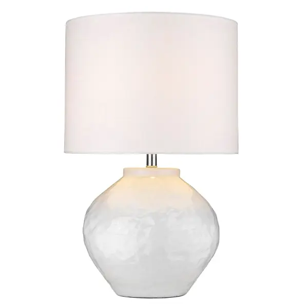 This versatile table lamp combines a polished ceramic base with a neutral seasalt linen drum shade, offering timeless style that complements both traditional and contemporary interiors. At 25.5 inches tall, it provides substantial presence without overwhelming smaller spaces. - alternate view