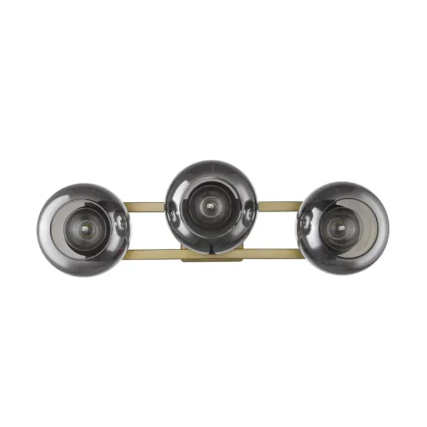 The Lunette sconce combines aged brass metalwork with three smoked glass globes for a refined, contemporary look. At 26 inches wide, it makes a bold statement perfect for vanities or accent walls.