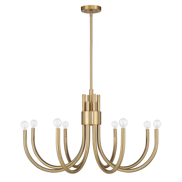 The Sorrento chandelier makes a striking statement with its curved tubular arms and exposed bulb design. The Noble Brass finish adds warmth and sophistication, while the generous 34-inch width provides substantial presence without overwhelming the space. - alternate view