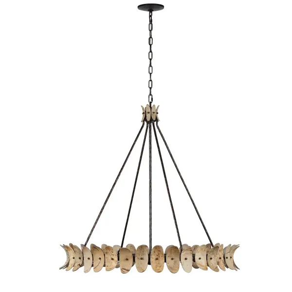 Designed by award-winning interior designer Breegan Jane, the Monarch chandelier brings organic elegance with hand-crafted coconut shell leaves and a luxurious Champagne Mist finish. Each piece is unique with natural variations.