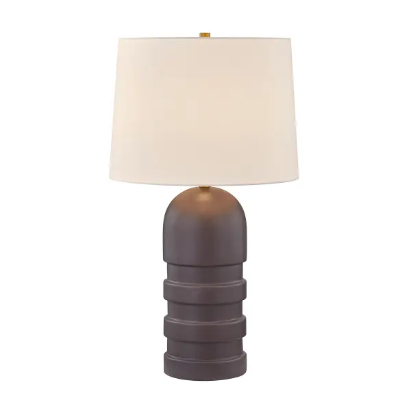 The Wehunt table lamp makes a dramatic impact with its distinctive bullet-shaped ceramic body in rich brown tones. At 32 inches tall, this substantial piece commands attention while the white fabric shade softens the bold silhouette.