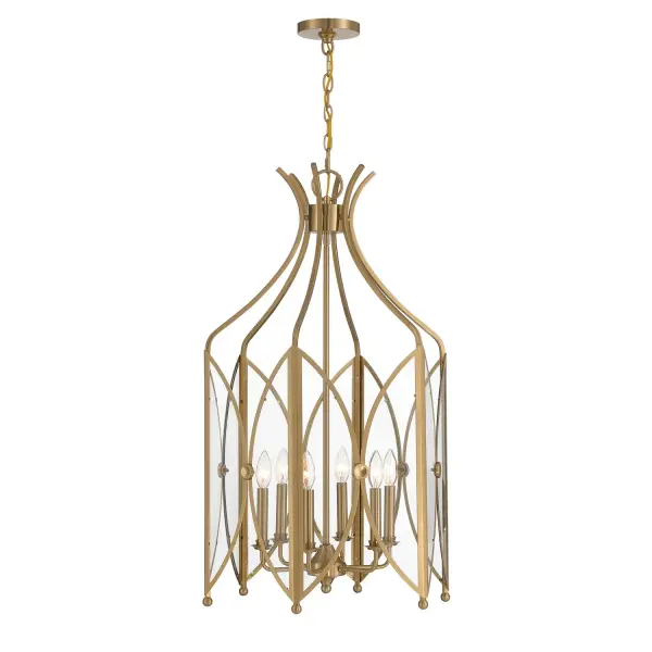 The Enclave pendant combines architectural drama with refined elegance through its distinctive curved glass panels that evoke organic leaf forms. The Noble Brass finish adds warmth and luxury, while the generous 21-inch width makes a bold statement in grand spaces.