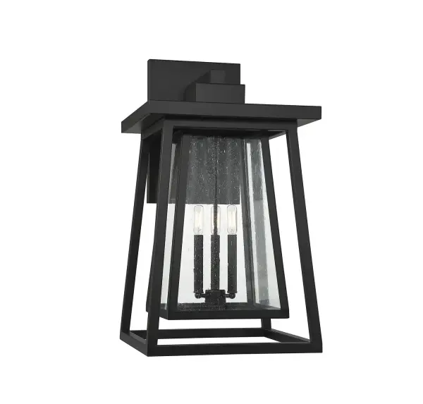 The Denver wall lantern delivers authentic Craftsman style with its substantial 29-inch height and clear seeded glass. The matte black finish and wet-rated construction make it ideal for enhancing curb appeal on modern farmhouse and traditional homes.