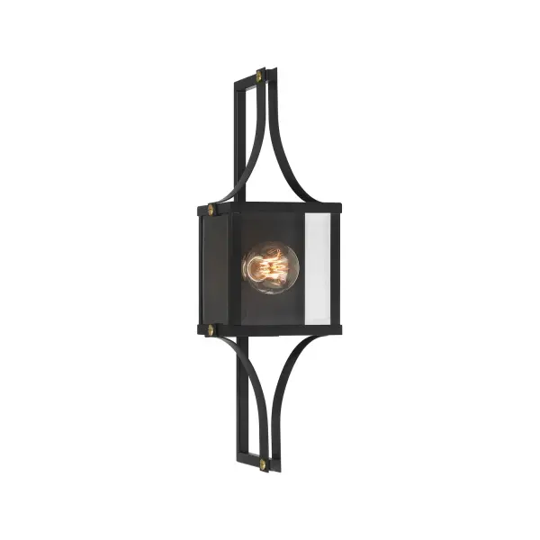 The Raeburn outdoor wall lantern combines contemporary geometric styling with industrial flair. Its structured frame in matte black with brass accents creates visual interest, while beveled clear glass adds sophistication.