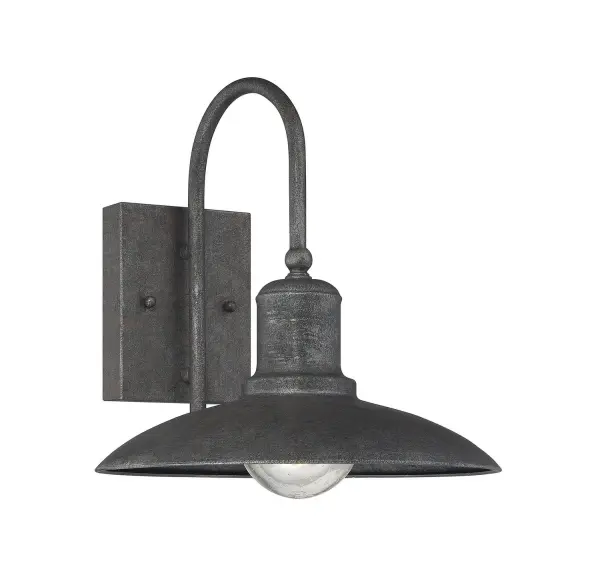 This gooseneck wall lantern brings retro industrial charm to outdoor spaces with its artisan rust finish and clear seeded glass. The vintage storefront design pairs beautifully with farmhouse and rustic exteriors while providing reliable downlight illumination.