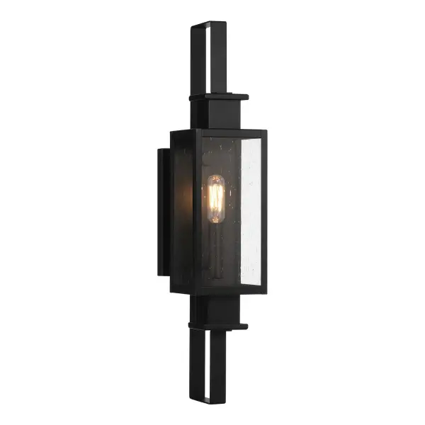 The Ascott outdoor wall lantern delivers modern sophistication with its slender profile and angular frame. Clear seeded glass adds texture while the matte black finish provides timeless appeal for contemporary exteriors.