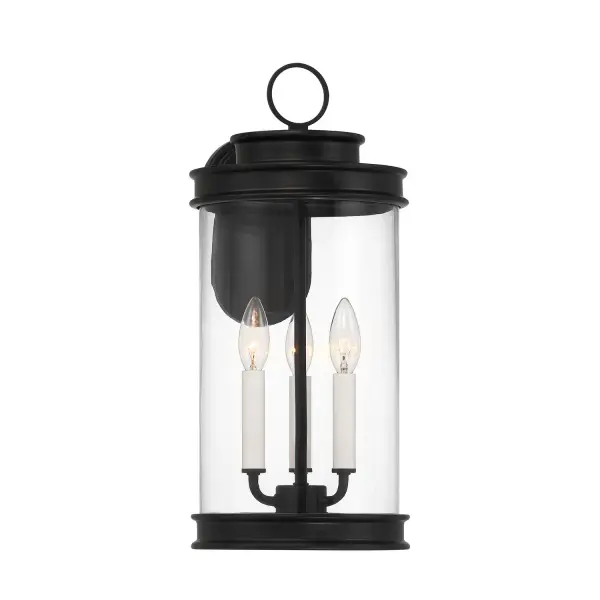 The Englewood outdoor wall lantern reimagines traditional lantern design with clean lines and a minimalist matte black frame. Clear glass and white candle covers create timeless appeal, while wet-rated construction ensures durability.