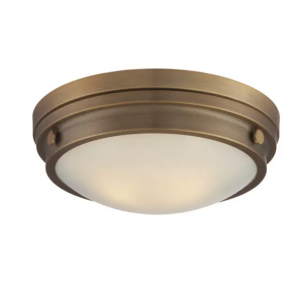 The Lucerne flush mount delivers warm metallic style with practical functionality. Its compact 13.25" profile and white glass shade provide comfortable ambient light for smaller spaces. The warm brass finish adds sophistication without overwhelming.