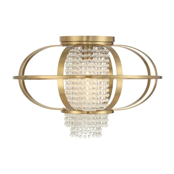 The Idlewild flush mount masterfully blends elegance with edge, featuring a sleek metal cage surrounding rows of clear crystal beads. The warm brass finish adds sophistication while the 20-inch width makes a statement without overwhelming.