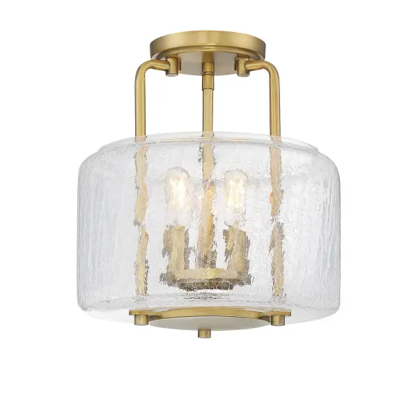 The Avalon blends traditional elegance with contemporary simplicity through its warm brass frame and distinctive crackled glass drum shade. At just over 11 inches wide, it's perfectly sized for smaller spaces needing ambient lighting with character.