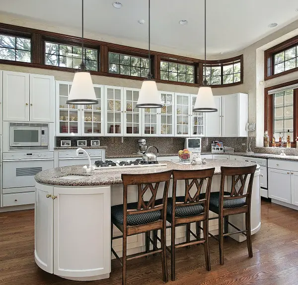 The Ashmont pendant delivers versatile style with its white opal glass shade and classic bronze finish. Perfect for spaces needing warm, diffused light, it adapts to both traditional and transitional interiors. - alternate view