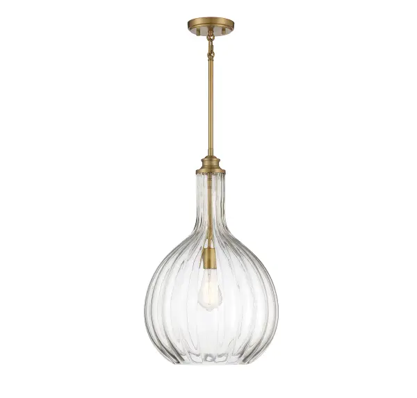 The Brandon pendant combines timeless elegance with modern versatility. Its generously sized clear fluted glass shade and warm brass finish create a sophisticated focal point that works beautifully in both traditional and contemporary spaces.