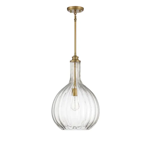 The Brandon pendant combines timeless elegance with modern versatility. Its generously sized clear fluted glass shade and warm brass finish create a sophisticated focal point that works beautifully in both traditional and contemporary spaces. - alternate view