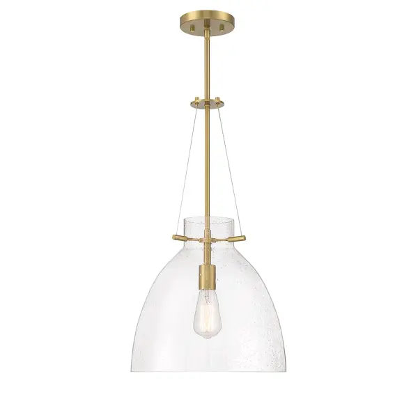 The Foster pendant combines a gently curved seeded glass shade with warm brass hardware for a refined, versatile look. Its 14-inch width makes it ideal for dining tables, kitchen islands, and entryways without overwhelming the space.