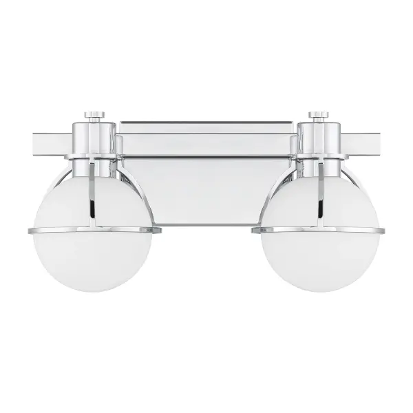 The Pierce 2-light vanity brings factory-inspired charm to bathroom lighting with its distinctive half-cage design and bright opal glass globes. Chrome finish adds contemporary polish while maintaining industrial character. - alternate view