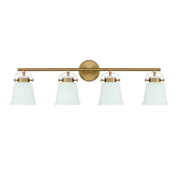 The Kaden 4-light vanity combines timeless design with industrial-inspired hardware in a warm brass finish. White opal glass shades provide even, flattering illumination perfect for bathroom tasks. - alternate view