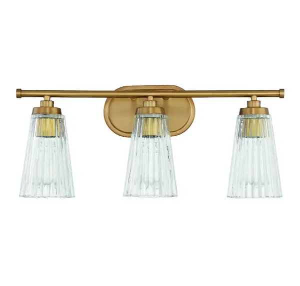 The Chantilly vanity light combines textured clear ribbed glass shades with a sophisticated warm brass finish, creating a refined focal point for bathroom spaces. Its 22-inch width makes it ideal for medium vanities. - alternate view