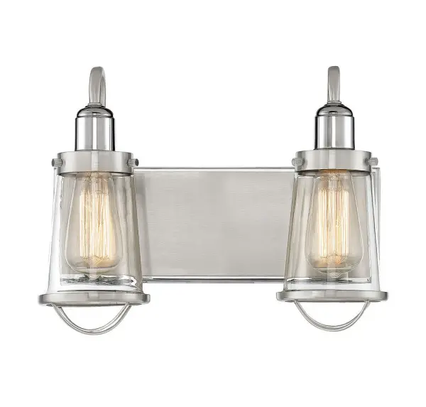 The Lansing bath bar delivers authentic industrial style with its cage-like shades and mixed metal finishes. Perfect for modern farmhouse or transitional spaces, it provides ample task lighting while adding vintage character above any vanity.